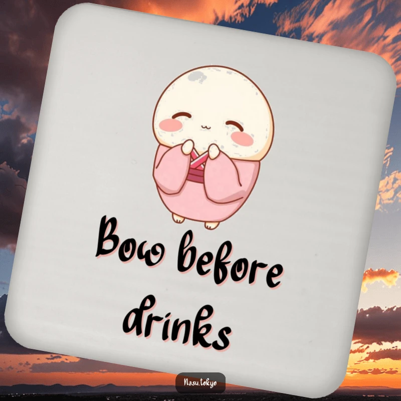 Funny round mochi wearing a pink kimono bowing gracefully, a humorous and protective drink coaster.