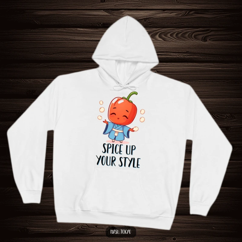Funny and artistic red pepper in a blue kimono juggling rice balls, depicted on a soft, warm hoodie for ultimate comfort.